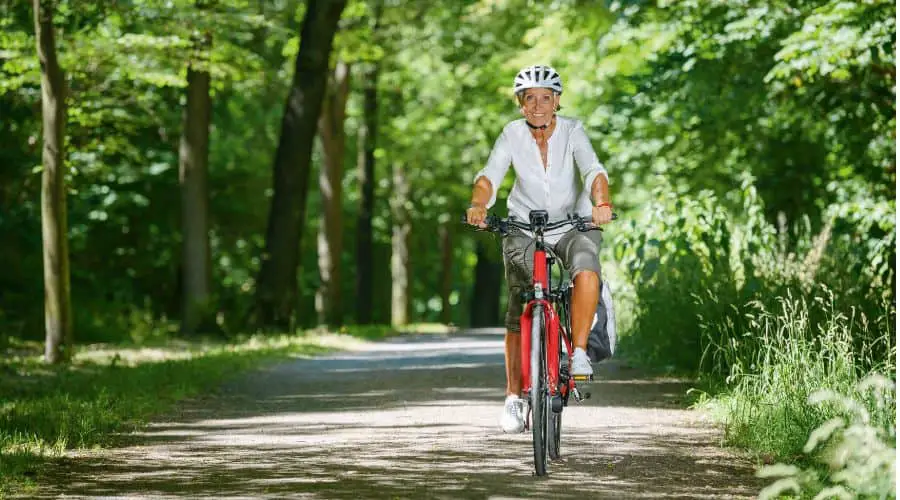 Easy E-Biking - female cyclist on a trail, helping to make electric biking practical and fun