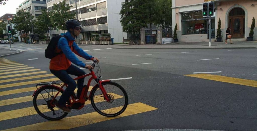 Easy E-Biking - man riding e-bike city, helping to make electric biking practical and fun